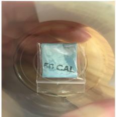 A “50 CAL” drug packet retrieved from a patient, which contained heroin, synthetic cannabinoid, and fentanyl.