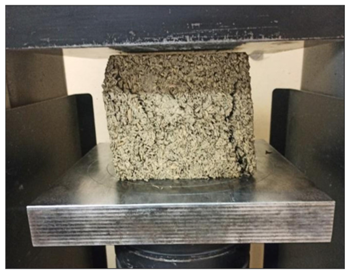 Photo of compressive strength test. (Source: own photo).