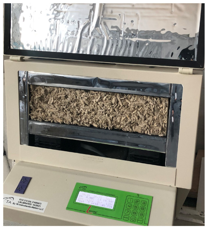Thermal conductivity testing using the FOX 314 apparatus.