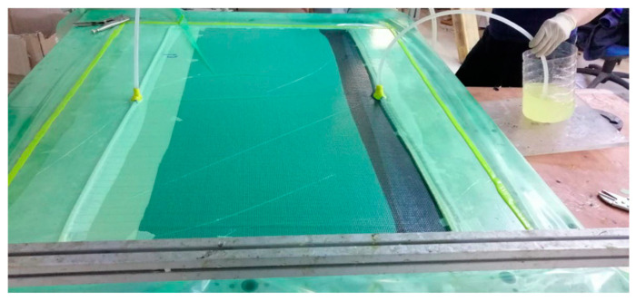 Epoxy resin impregnation by the vacuum infusion method.